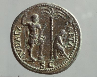 Imperial coin showing mourning figures with the inscription 